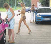 Nude blonde visits petrol station creating public disturbance