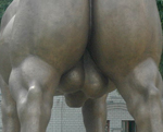 Muscular bronze stallion with weird human genitalia advertises provincial hotel